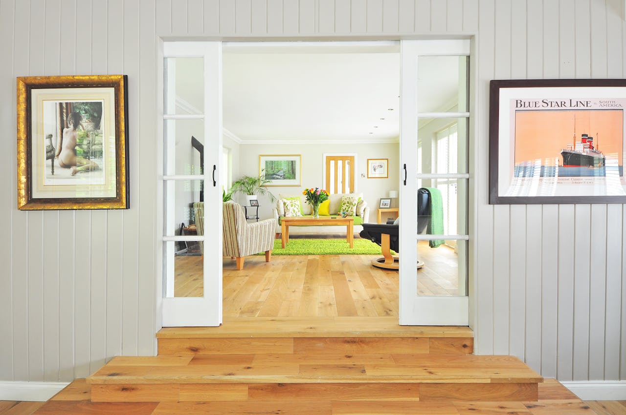 gallery-1 A bright and open living room showcasing contemporary interior design and luxury furnishings.